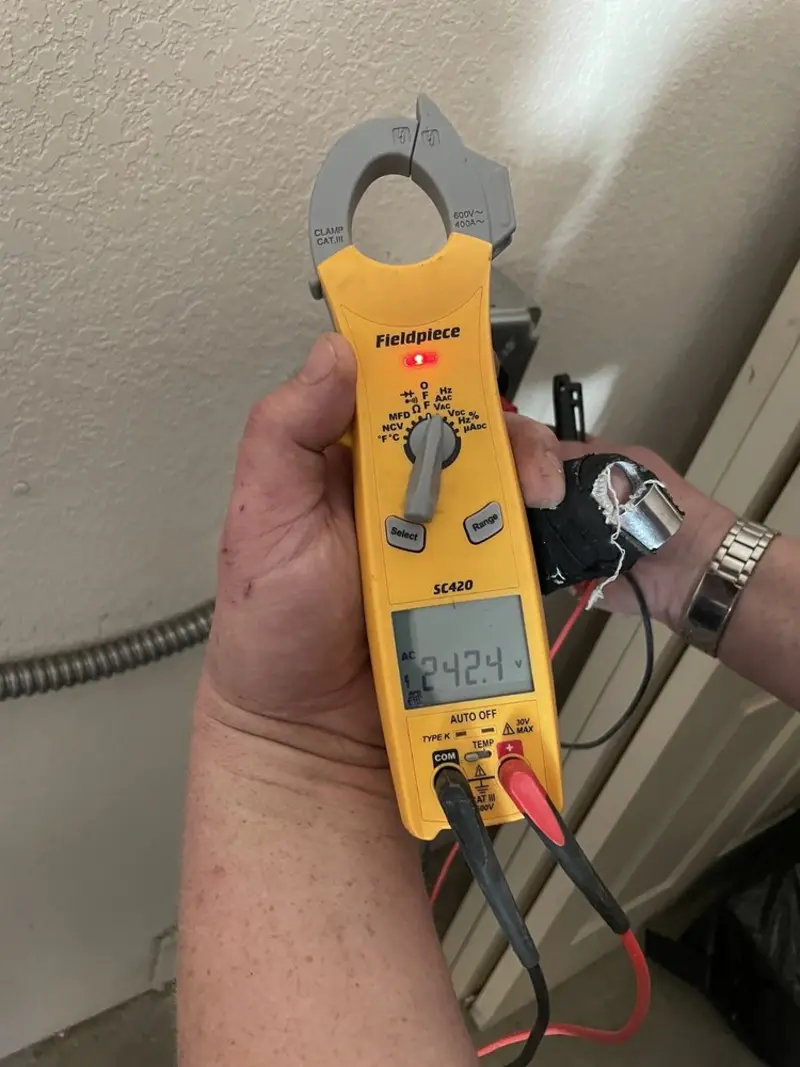 Voltage testing with clamp meter during Generator Installation in Alton